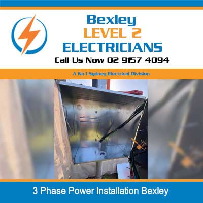 Level 2 electrician installing 3 phase power system and working on electrical panel in Bexley