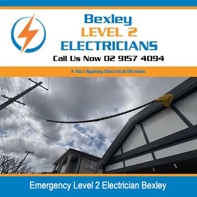 Emergency level 2 electrician inspecting overhead power lines during urgent electrical repair in Bexley