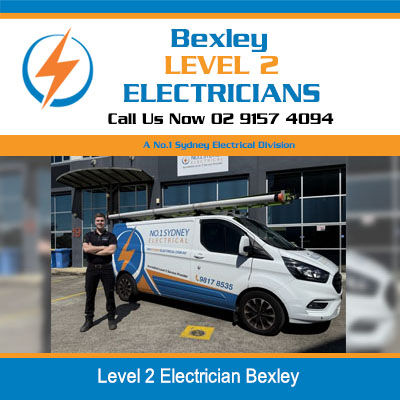 Level 2 electrician standing beside service van ready to provide electrical services in Bexley
