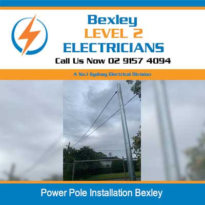 Level 2 electrician installing new private power pole with overhead lines in Bexley